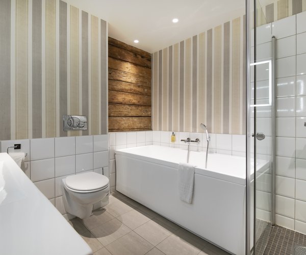 Suite bathroom with bath and separate shower